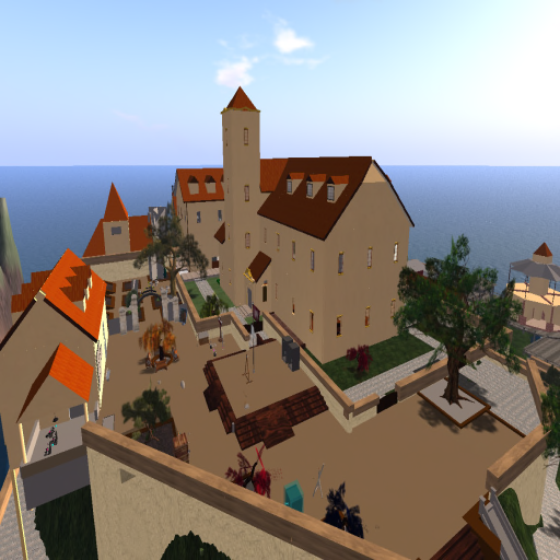 a large castle complex with orange roofs and interior courtyards.