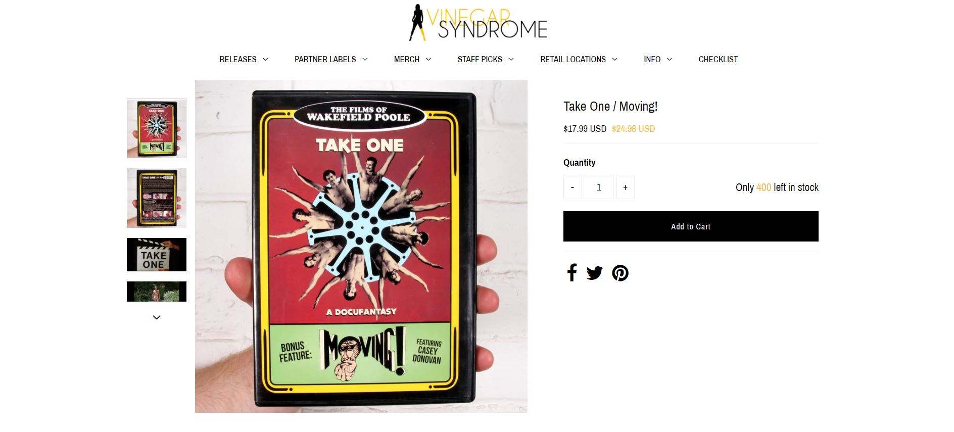 a hand holds a DVD video of 'Take One.' The price of the DVD is $17.99 USD.