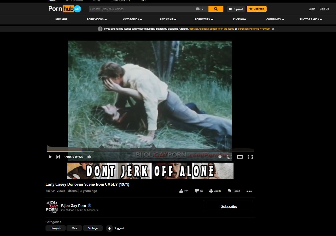 Web-screenshot from PornHub, with text 'Early Casey Donovan Scene from CASEY (1971).' Advertisements read 'DONT JERK OFF ALONE.'